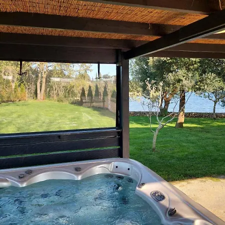 Holiday home House Ive: Coastal Retreat With Jacuzzi, Pool And Olive Grove Pomer